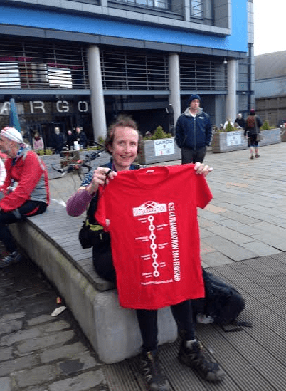 Proudly sporting medal and T shirt!